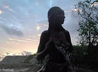 Skinny Dark Skinned African Hottie Teases Solo With Tits In The Water Showing Softcore Moves