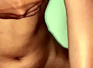 Sexy teen girl teases by touching natural boobs and fingering small tight pink pussy in homemade solo