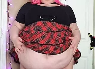 Hairy chubby bbw spreads wet pussy solo in miniskirt