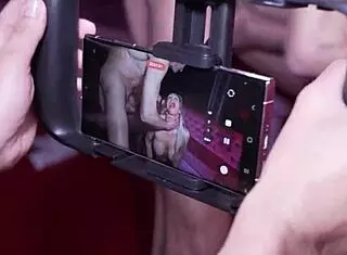 behind the scenes a hot blonde and brunette get fucked hard in a swinger club with blowjobs and squirting action