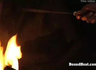 European teen slave receives a mark on her pussy in this intriguing bondage scene with lezdom mistress