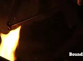 European teen slave receives a mark on her pussy in this intriguing bondage scene with lezdom mistress