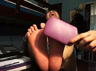 she tied her toes for a thrilling self tickle session exploring foot fetish desires