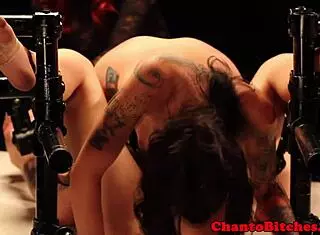 Two lezdom mistresses punish bound subs in garage. They use bdsm bondage for femdom domination over the submissive lesbians.