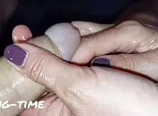 Slut wife dominates with oiled handjob on big cock during kinky british femdom milking session.