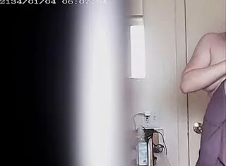 Big Boobs Blonde Changing Clothes In Voyeur View