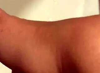 she teases her pussy with slow fingering in this solo session. the intense masturbation builds to a wild orgasm with shaking tits.