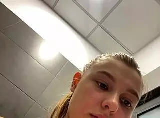 The amateur teen casually fingered her wet pussy in a public outdoor spot.