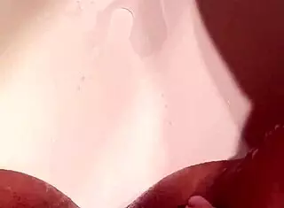 she teases her pussy with slow fingering in this solo session. the intense masturbation builds to a wild orgasm with shaking tits.