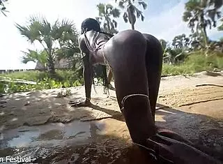 Lucky foreigner fucks african tribe queen with perfect body in village river outdoors