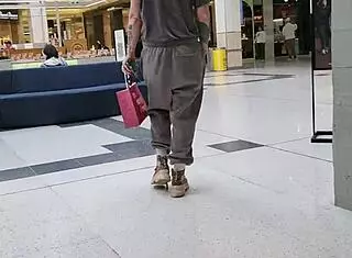 Trashy Kiwi slut flashes her tattooed body and pierced pussy at the mall! She teases on a busy public street like a dirty submissive bitch.