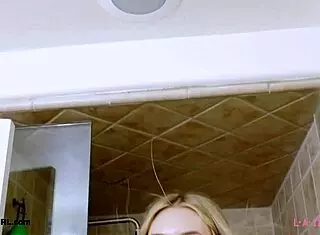 blonde muse preps for photoshoot in shower