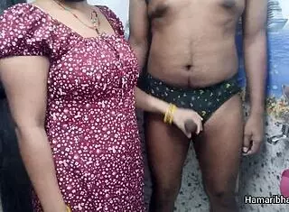 this indian desi bhabhi casually gives her husband an intense handjob in the bathroom, making him cum hard on her sexy blue panties