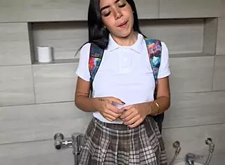 Petite student babe in uniform skirt rides teacher's cock in cowgirl then bends over for doggystyle creampie in bathroom quickie