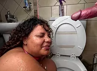 bbw brunette takes interracial deepthroat with gagging next to toilet in garage