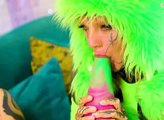 Tattooed sluts dive into a wild lesbian orgy with dildos and costumes. They ride vibrators to huge orgasms in goth style.