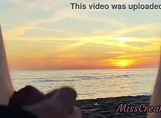 Flashing my cock in front of my stepdaughter at sunset in a public beach and she helps me cumshot in front of everyone - real sex risky