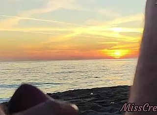 Flashing my cock in front of my stepdaughter at sunset in a public beach and she helps me cumshot in front of everyone - real sex risky