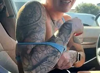 just a girl trying to adjust her sports bra properly in the gym parking lot