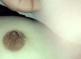 Gretala's toy cock on her breasts