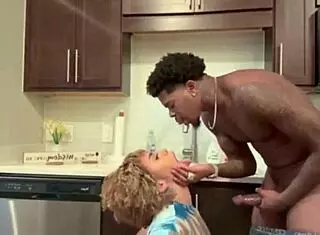 This 18yo ebony gets bent over in the kitchen. Big black cock pounds her doggystyle until creampie.