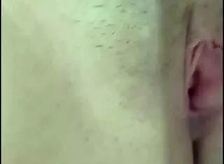 Blonde beauty spreads her legs wide to reveal pink vagina details up close in explicit display with latina flair