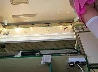 This super sexy slim eighteen-year-old chick is working in pear thongs and going braless outdoors.