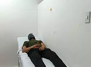 kinky doctor jerks his cock in the office all alone