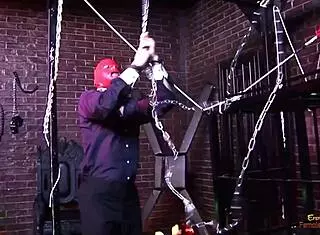 Intense double penetration sex dominates two mistresses in latex outfits and stockings in the sex dungeon