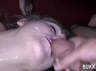 Babe Gives Blowjob in Extreme Bukkake Gangbang with Cumshots