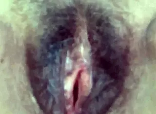 Big hairy pussy after intense fucking session filled with hot cum inside