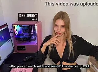 Blonde girl teases seductively on camera outdoors with panties showing.