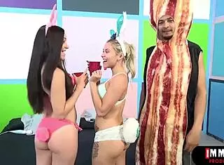 Easter bunny babes take on big black cock in wild threesome with blowjobs and doggystyle.