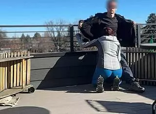 A little 18+ redhead slut flashes and gives fast handjob with blowjob on roof while boyfriend waits