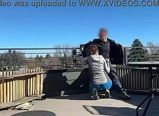 A little 18+ redhead slut flashes and gives fast handjob with blowjob on roof while boyfriend waits