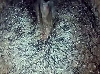 so this ebony chick starts playing with her wet hairy pussy at home. she rips clothes for solo orgasm in dripping beaver action.