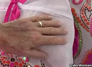 why is this granny with big tits getting finger fucked by the photographer?