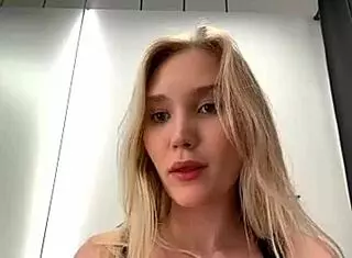 maria thull performs a captivating striptease, slowly undressing with clothes ripped in a blonde solo session