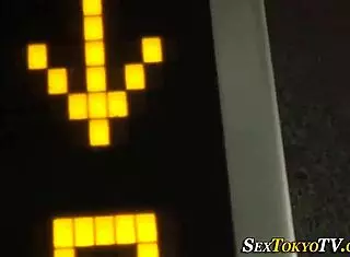 Asian teen explores public self-touch in intriguing display.