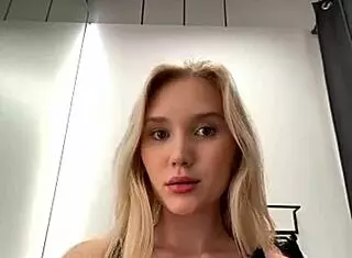 maria thull performs a captivating striptease, slowly undressing with clothes ripped in a blonde solo session