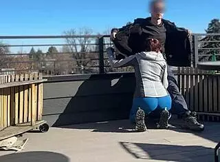 A little 18+ redhead slut flashes and gives fast handjob with blowjob on roof while boyfriend waits