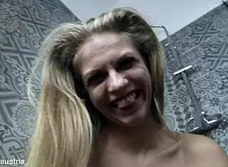 blond skinny babe with small tits masturbates in shower