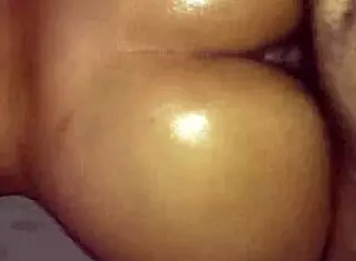 Oily Prostitute Ass Cheeks Jiggle Seductively in Close-Up Tease