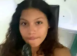 that petite babe masturbates her pussy so erotic in the chair loving every toy touch