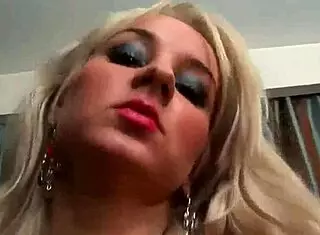 oiled busty blonde teases with toys on cam?