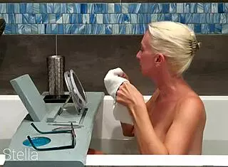 Milf Stella Shaves Pussy and Body While Bathing in Tub