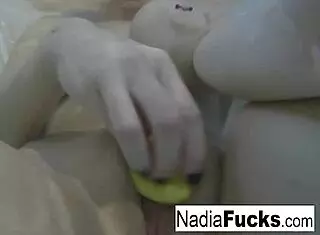 nadia bathes seductively with playful rubber duckies