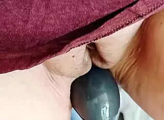 mature woman's huge shaved pussy lips spread wide for flashing