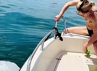 sexy blonde housewife washes boat in skimpy thong bikini barefoot summer fun