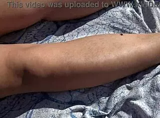 wanna watch this hairy french milf get cum dumped on her pussy by a perv on the beach?